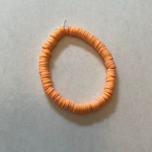 Handmade orange bracelet
